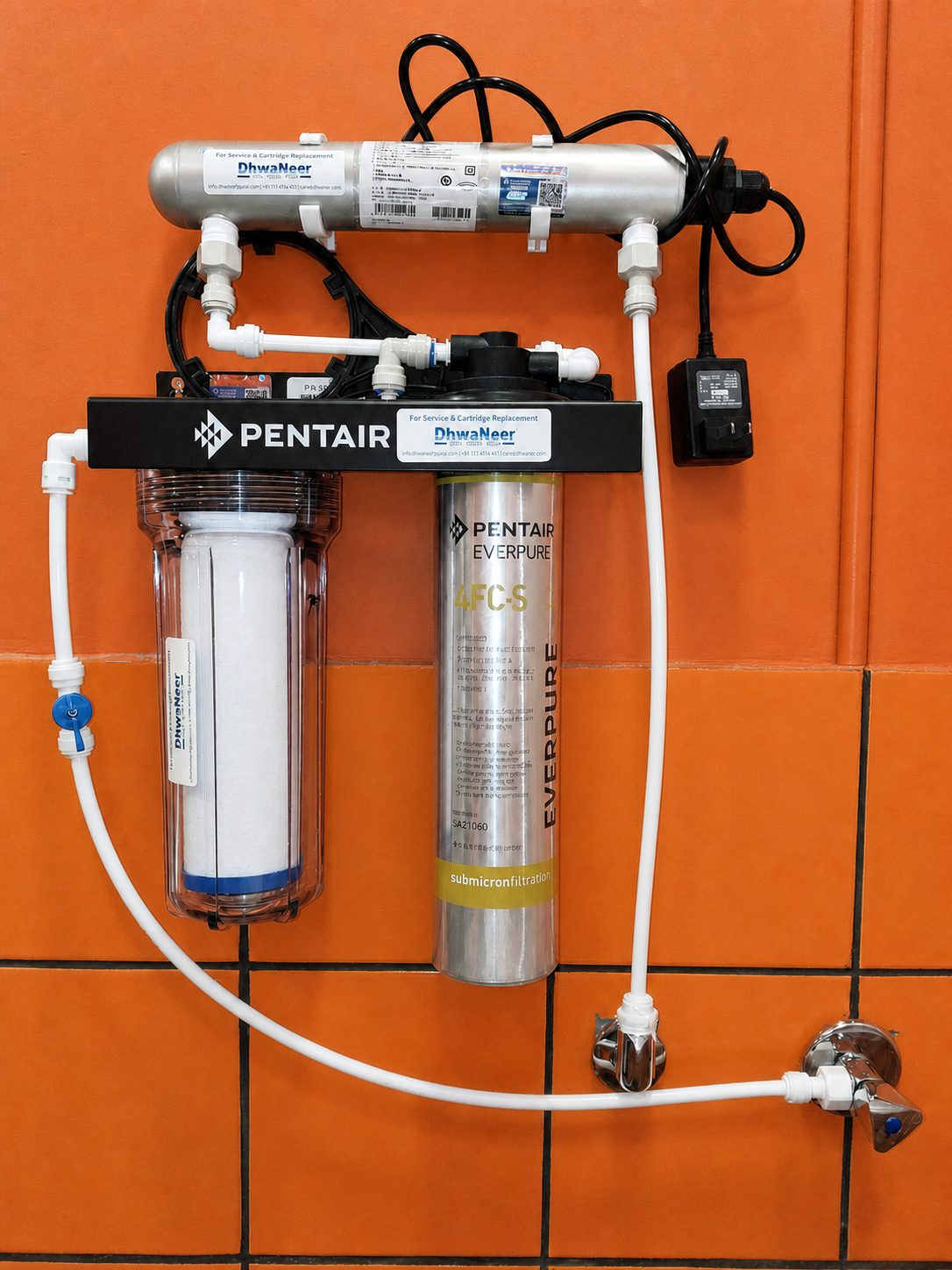 Point-of-use Pentair Everpure 4FC-S submicron filtration with UV for a speciality caf&eacute; beverage line, with DhwaNeer service tags